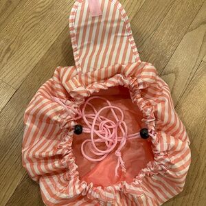 Cosmetic bag expandable stripe pink